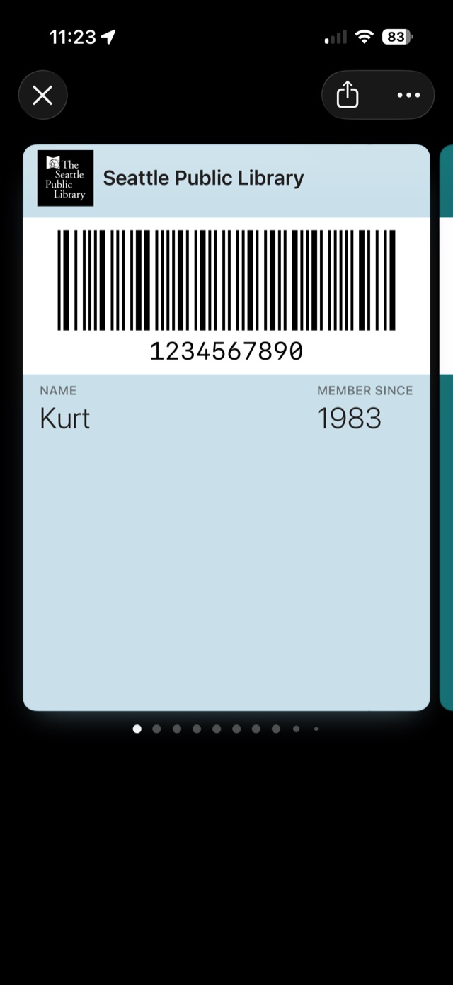 The finished library
         card sitting in Apple Wallet.